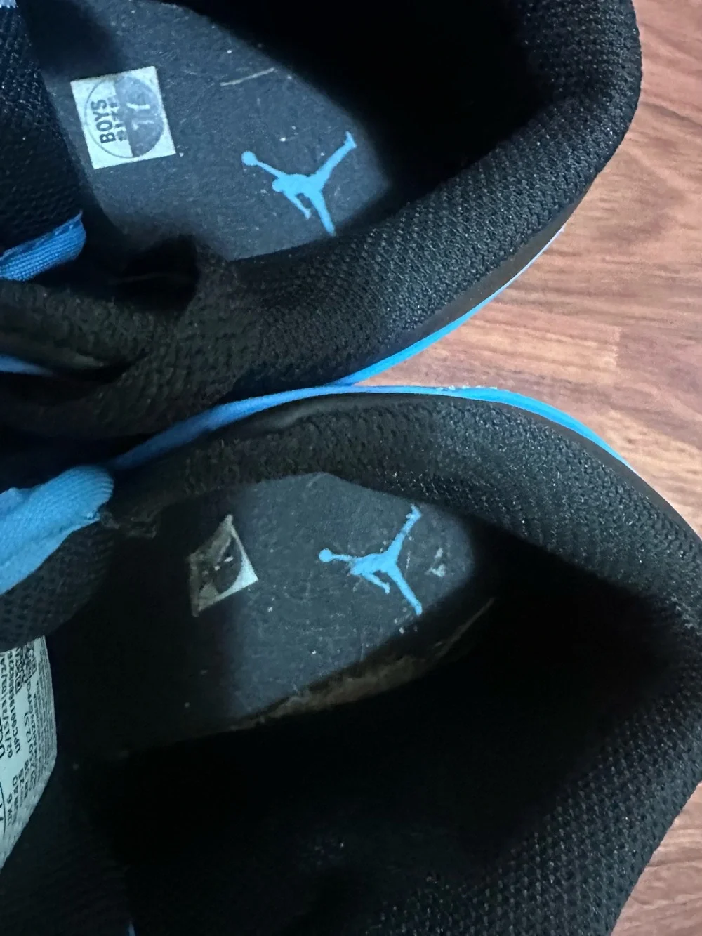 Jordan Youths Light Blue and Black High-Top Sneakers